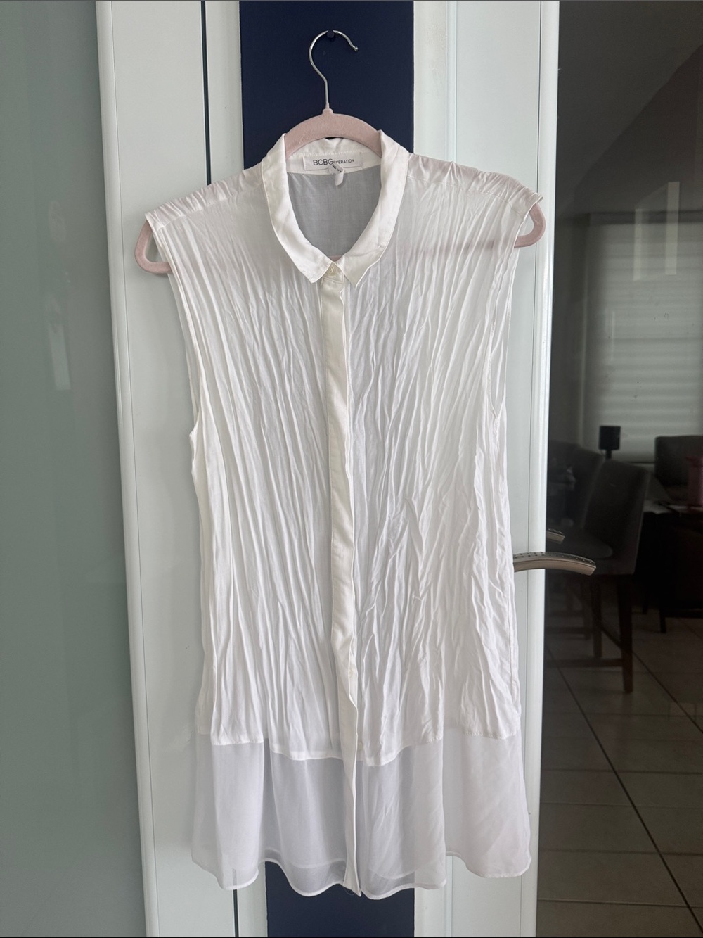BCBGeneration White Sleeveless Pleated Button-Front Blouse with Sheer Hem Panel